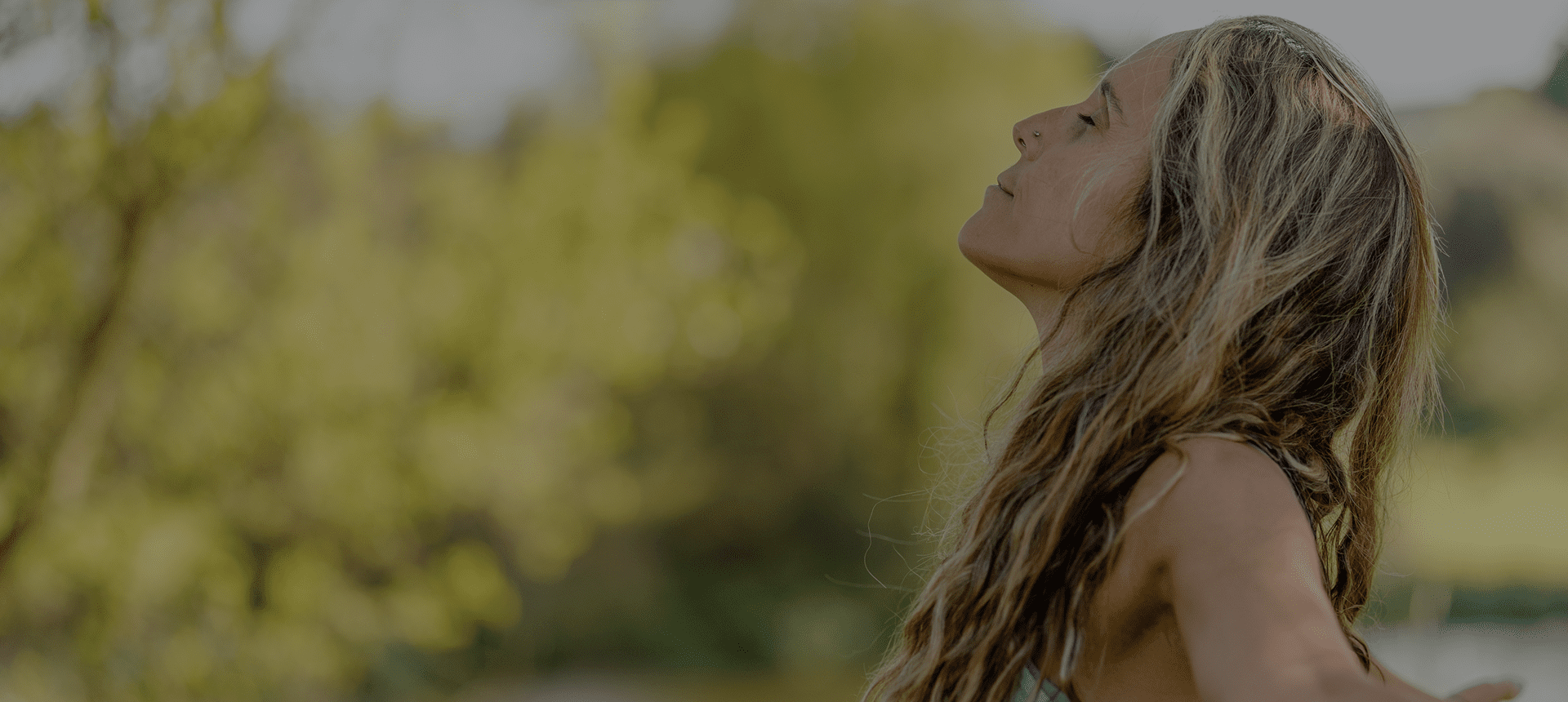 Relaxed woman in natural setting